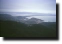 Panorama verso Porto
Ercole, il Tombolo di Feniglia
e Orbetello, dalla cima dello
spigolo delle Canne d’Organo
(Foto: 474-070101-12)
(14554 bytes)